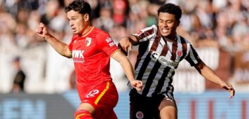 Hamburg, 14. September 2025 - Fußball, 1. Bundesliga 2025/26, FC St. Pauli - FC Augsburg: Fabian Rieder FC Augsburg, 32, Joel Chima Fujita FC St. Pauli, 16 DFL REGULATIONS PROHIBIT ANY USE OF PHOTOGRAPHS AS IMAGE SEQUENCES AND/OR QUASI-VIDEO. *** Hamburg, 14 September 2025 Football, 1 Bundesliga 2025 26, FC St Pauli FC Augsburg Fabian Rieder FC Augsburg, 32 , Joel Chima Fujita FC St Pauli, 16 DFL REGULATIONS PROHIBIT ANY USE OF PHOTOGRAPHS AS IMAGE SEQUENCES AND OR QUASI VIDEO