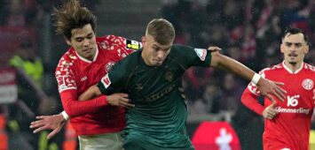 Sturmtank Keke Topp (SV Werder Bremen) im Duell mit Kaishu Sano (Main 05)