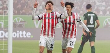 Fußball, Herren, Saison 2025/2026, 1. Bundesliga 15. Spieltag, VfL Wolfsburg - SC Freiburg, v. l. Philipp Treu Freiburg, Yuito Suzuki Freiburg, Jubel nach Tor zum 0:1, 20.12.2025, *** Soccer, Men, Season 2025 2026, 1 Bundesliga 15 Matchday , VfL Wolfsburg SC Freiburg, f l Philipp Treu Freiburg , Yuito Suzuki Freiburg , Cheering after goal to 0 1, 20 12 2025, Copyright: xSebastianxRäppold/MatthiasxKochx