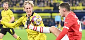PSV Eindhovens Sechser Joey Veerman im Champions-League-Duell mit BVB-Star Julian Brandt
