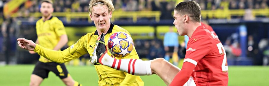PSV Eindhovens Sechser Joey Veerman im Champions-League-Duell mit BVB-Star Julian Brandt