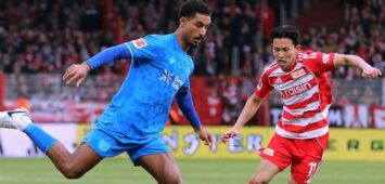 Loic Bade am Ball, Wooyeong Jeong / Zweikampf / Spielszene / Aktion / / Fußball Fussball / Bundesliga Herren DFL / 23. Spieltag Saison 2025/2026 / 21.02.2026 / 1.FC Union Berlin FCU vs. Bayer 04 Leverkusen / DFL regulations prohibit any use of photographs as image sequences and/or quasi-video. / *** Loic Bade on the ball, Wooyeong Jeong duel Match scene Action Sport Football Soccer Bundesliga Men DFL 23 Matchday Season 2025 2026 21 02 2026 1 FC Union Berlin FCU vs Bayer 04 Leverkusen DFL regulations prohibit any use of photographs as image sequences and or quasi video