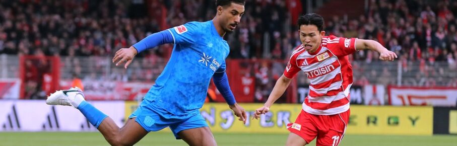 Loic Bade am Ball, Wooyeong Jeong / Zweikampf / Spielszene / Aktion / / Fußball Fussball / Bundesliga Herren DFL / 23. Spieltag Saison 2025/2026 / 21.02.2026 / 1.FC Union Berlin FCU vs. Bayer 04 Leverkusen / DFL regulations prohibit any use of photographs as image sequences and/or quasi-video. / *** Loic Bade on the ball, Wooyeong Jeong duel Match scene Action Sport Football Soccer Bundesliga Men DFL 23 Matchday Season 2025 2026 21 02 2026 1 FC Union Berlin FCU vs Bayer 04 Leverkusen DFL regulations prohibit any use of photographs as image sequences and or quasi video