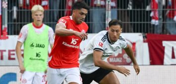 12.09.2026, xsltx, Fussball 1.Bundesliga, FSV Mainz 05 - Eintracht Frankfurt v.l. Nadiem Amiri 1. FSV Mainz 05, Younes Ebnoutalib Eintracht Frankfurt DFL/DFB REGULATIONS PROHIBIT ANY USE OF PHOTOGRAPHS as IMAGE SEQUENCES and/or QUASI-VIDEO *** September 12, 2026, xsltx, Soccer 1 Bundesliga, FSV Mainz 05 vs. Eintracht Frankfurt, Nadiem Amiri 1 FSV Mainz 05, Younes Ebnoutalib Eintracht Frankfurt. DFL and DFB regulations prohibit any use of photographs as image sequences and/or quasi-video.